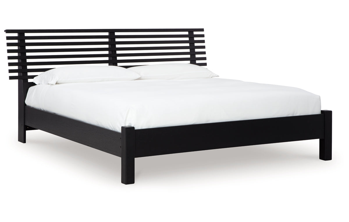 Danziar King Panel Bed with Mirrored Dresser and Chest
