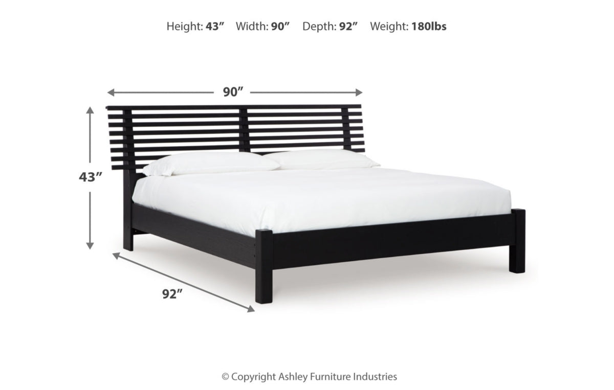 Danziar King Panel Bed with Mirrored Dresser, Chest and Nightstand