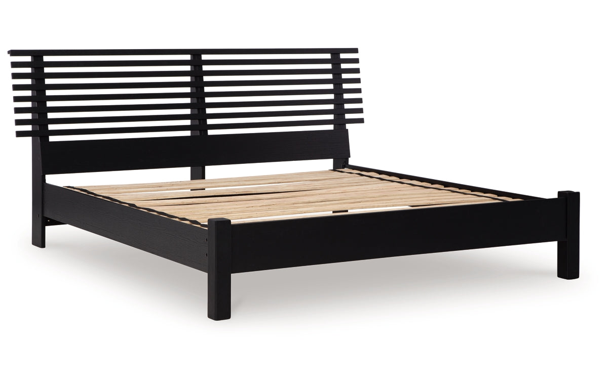 Danziar King Panel Bed with Mirrored Dresser and Nightstand