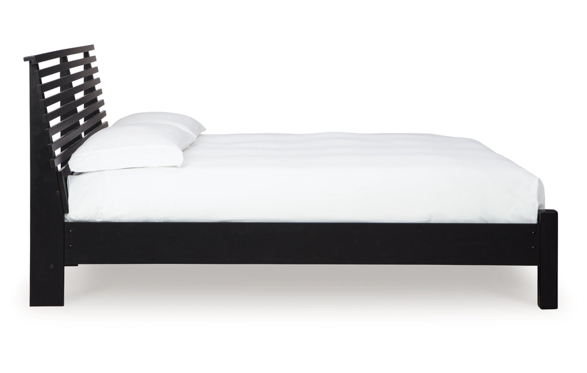 Danziar Queen Panel Bed with Mirrored Dresser and Chest