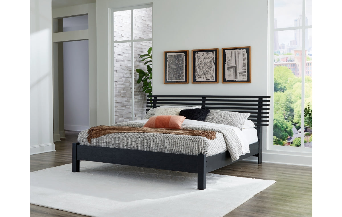Danziar King Panel Bed with Mirrored Dresser and Chest