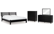 Danziar Queen Panel Bed with Mirrored Dresser and Chest