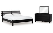 Danziar Queen Panel Bed with Mirrored Dresser