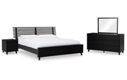 Danziar King Panel Bed with Mirrored Dresser and Nightstand