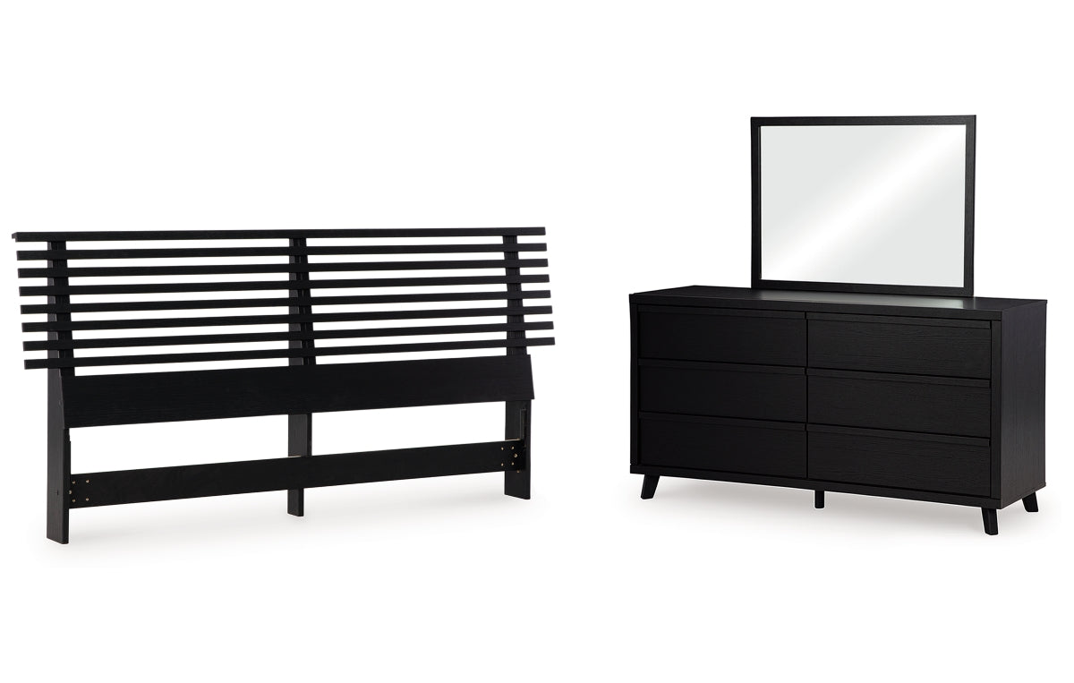Danziar King Panel Headboard with Mirrored Dresser