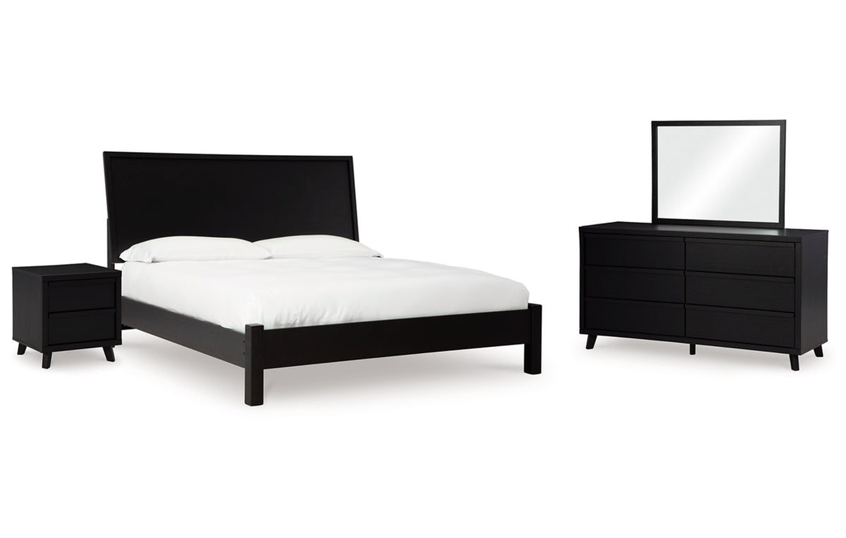Danziar King Panel Bed with Mirrored Dresser and Nightstand