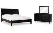 Danziar King Panel Bed with Mirrored Dresser
