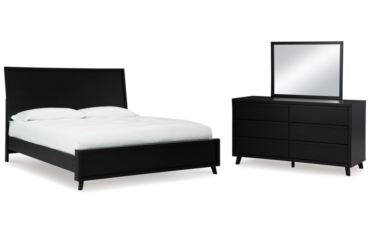 Danziar King Panel Bed with Mirrored Dresser