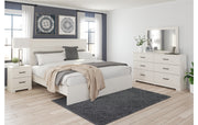 Stelsie King Panel Bed with Mirrored Dresser and Nightstand
