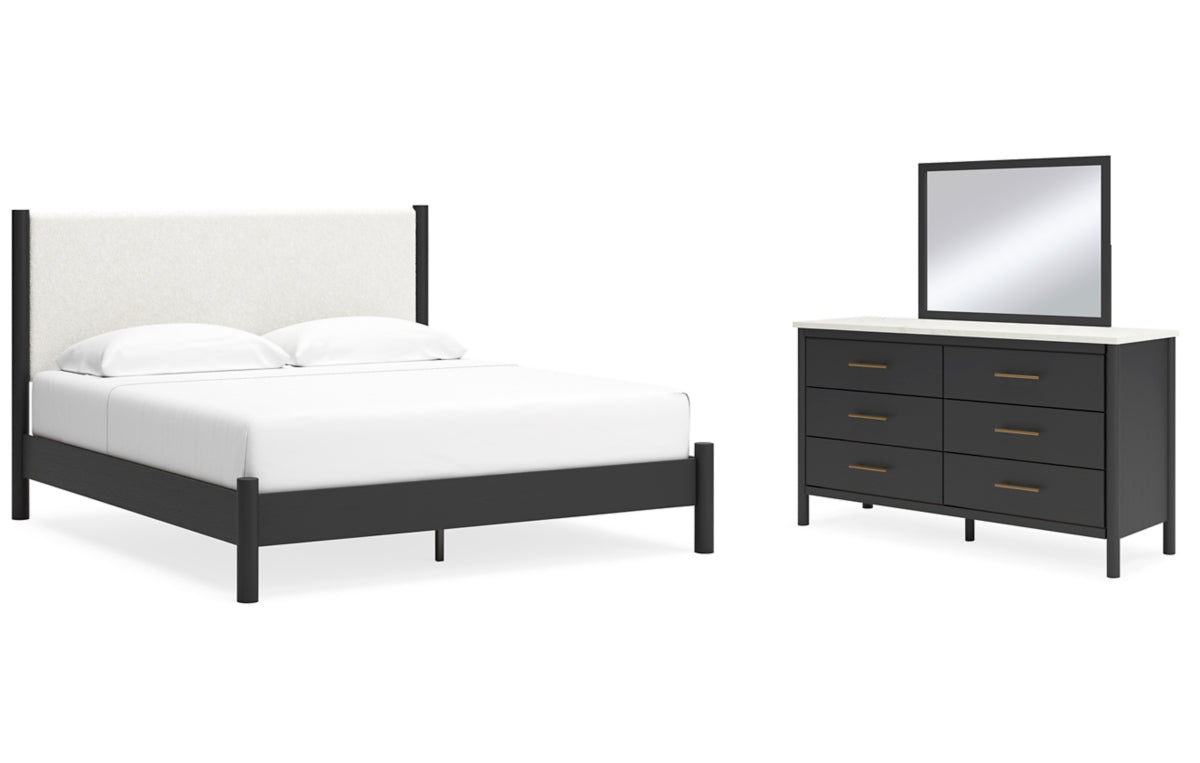 Cadmori King Upholstered Panel Bed with Mirrored Dresser