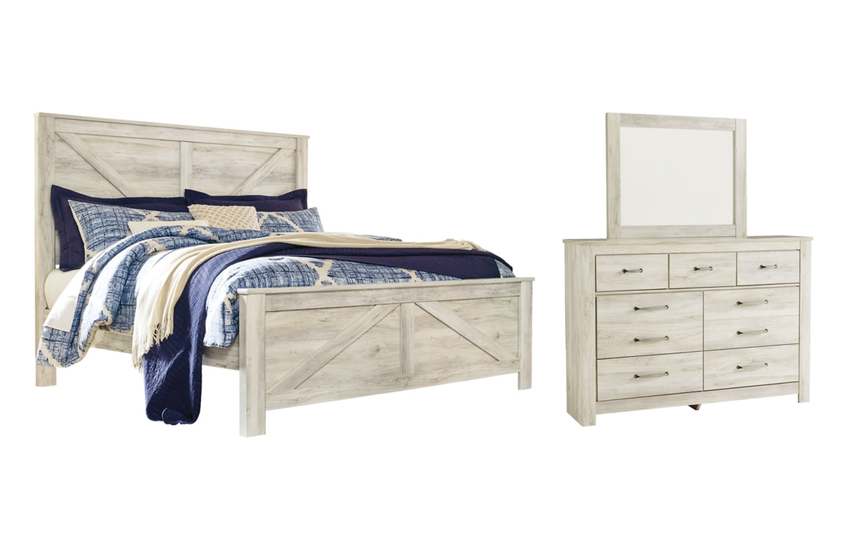 Bellaby King Crossbuck Panel Bed with Mirrored Dresser