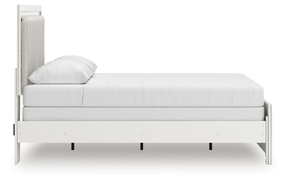 Zuraleus Queen Upholstered Panel Bed, Dresser, Mirror, Chest and Nightstand
