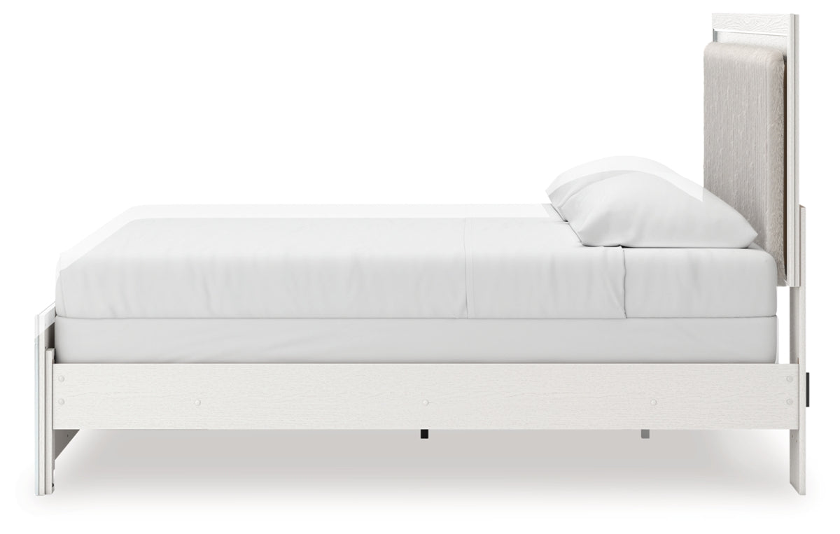 Zuraleus King Upholstered Panel Bed, Dresser, Mirror and Chest