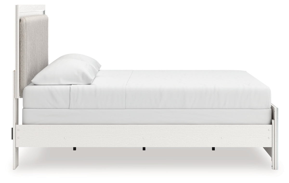 Zuraleus King Upholstered Panel Bed, Dresser, Mirror and Chest