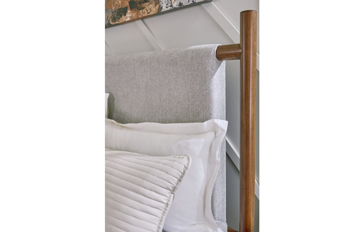 Lyncott California King Upholstered Bed with Mirrored Dresser