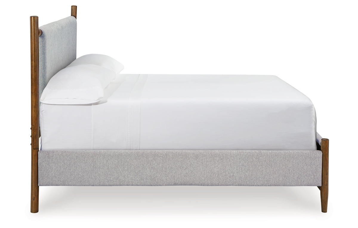 Lyncott California King Upholstered Bed, Dresser, Mirror and Chest