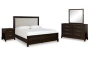 Neymorton California King Upholstered Panel Bed with Mirrored Dresser and Nightstand