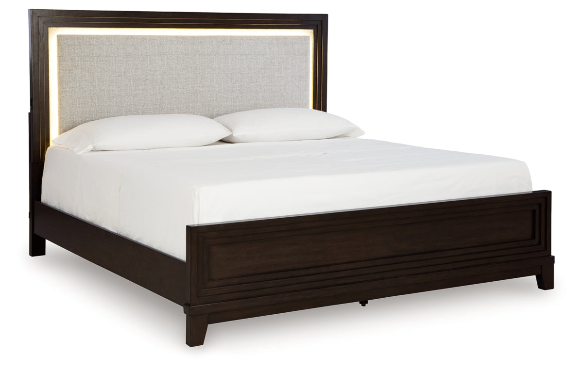 Neymorton California King Upholstered Panel Bed with Mirrored Dresser, Chest and Nightstand
