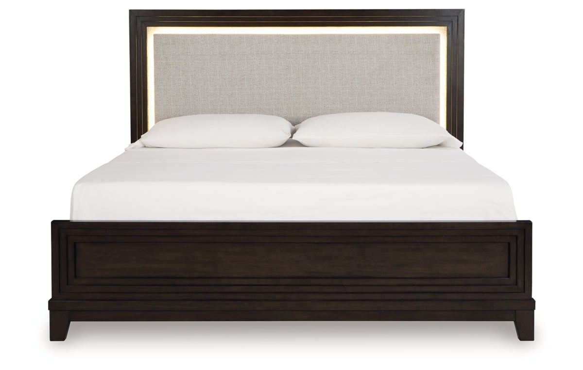 Neymorton California King Upholstered Panel Bed with Mirrored Dresser and Chest