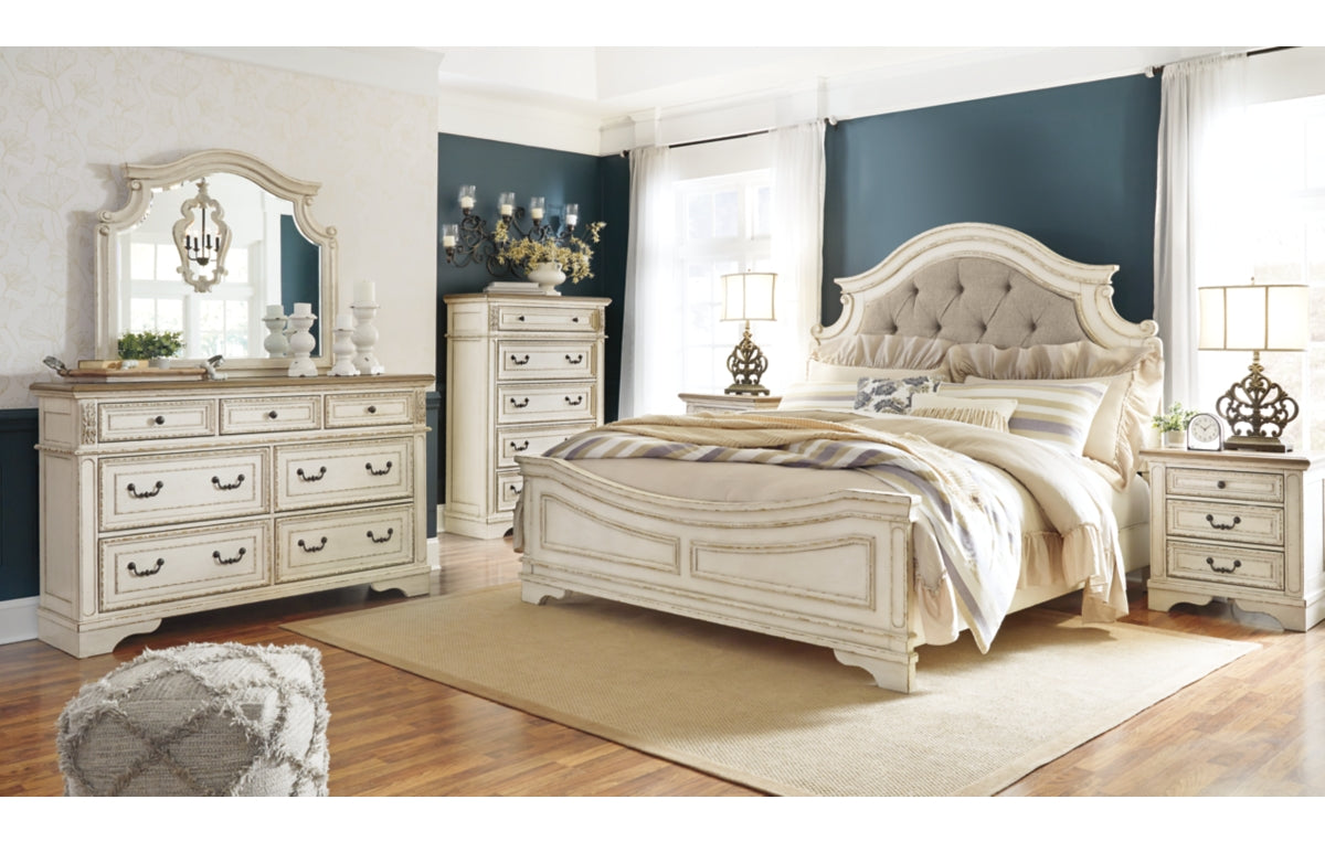 Realyn Queen Upholstered Panel Bed with Mirrored Dresser, Chest and Nightstand