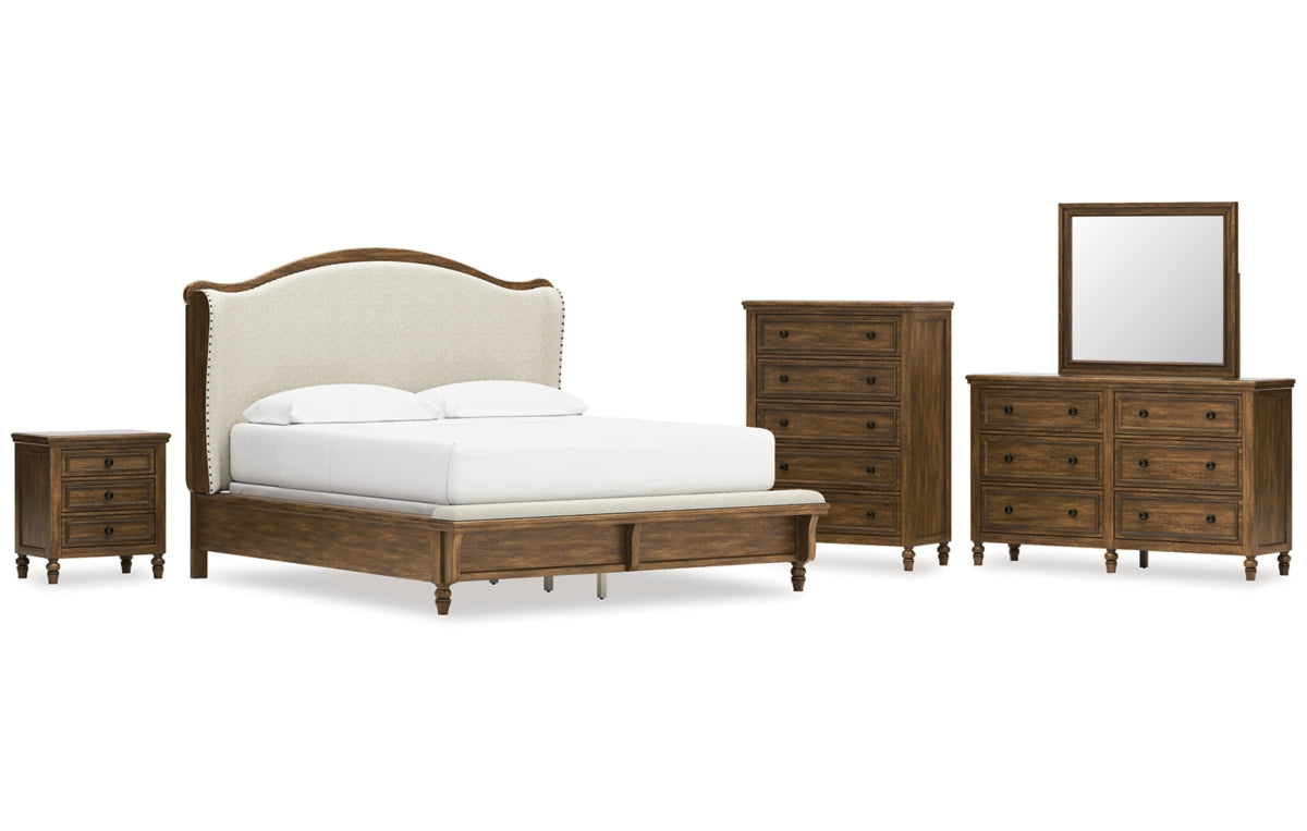 Sturlayne California King Upholstered Panel Bed with Mirrored Dresser, Chest and Nightstand