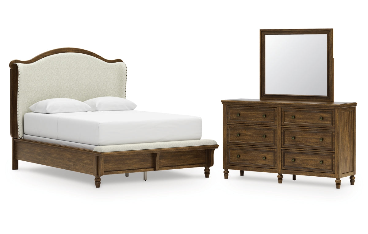Sturlayne Queen Upholstered Panel Bed with Mirrored Dresser