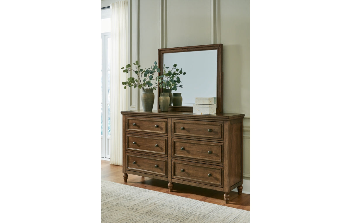 Sturlayne California King Upholstered Panel Bed with Mirrored Dresser, Chest and Nightstand