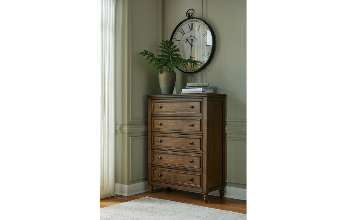 Sturlayne California King Upholstered Panel Bed with Mirrored Dresser and Chest