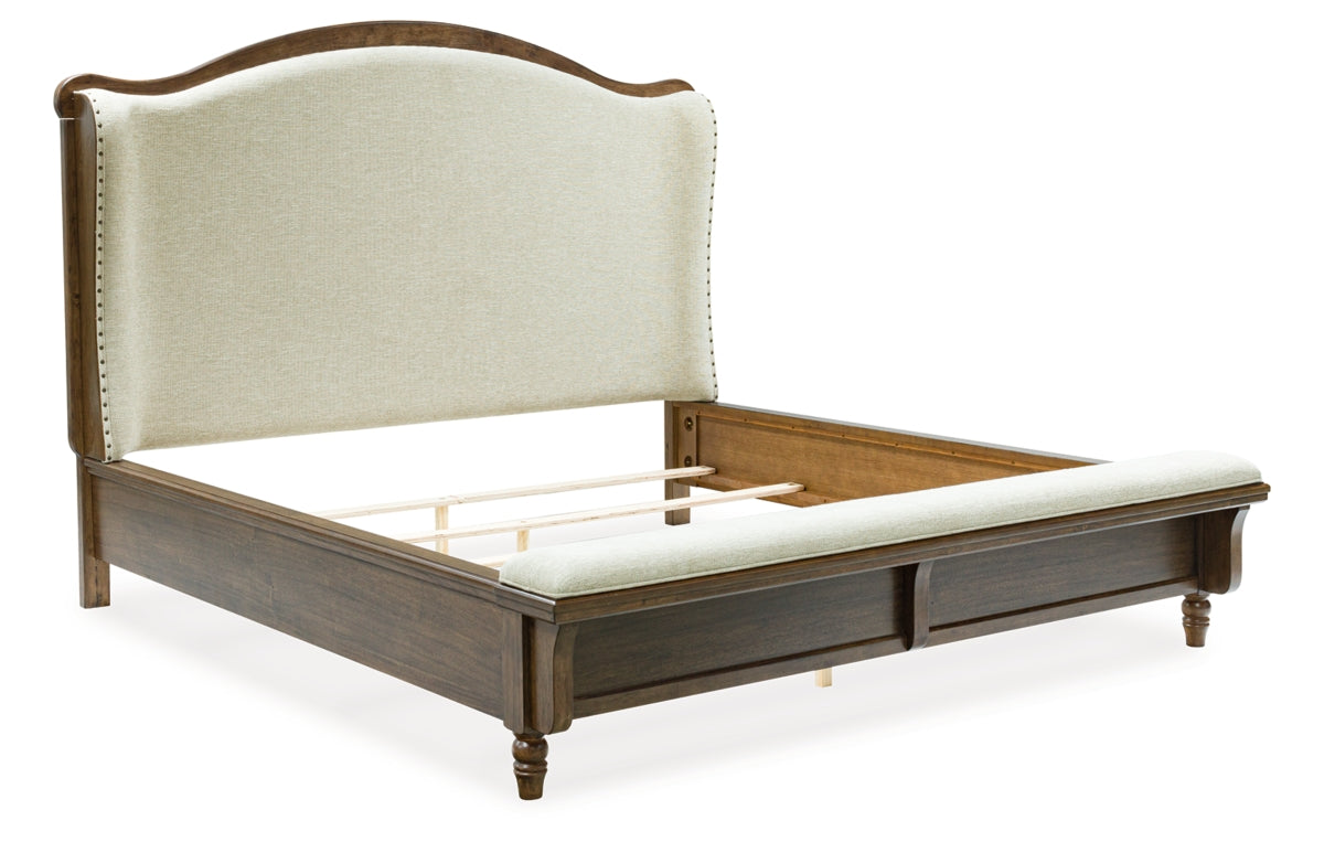 Sturlayne California King Upholstered Panel Bed, Dresser, Mirror and Chest