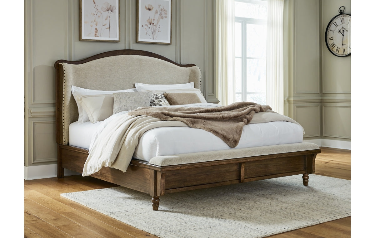 Sturlayne California King Upholstered Panel Bed, Dresser, Mirror and Chest