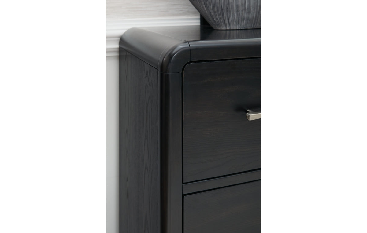 Rowanbeck California King Upholstered Panel Bed with Mirrored Dresser