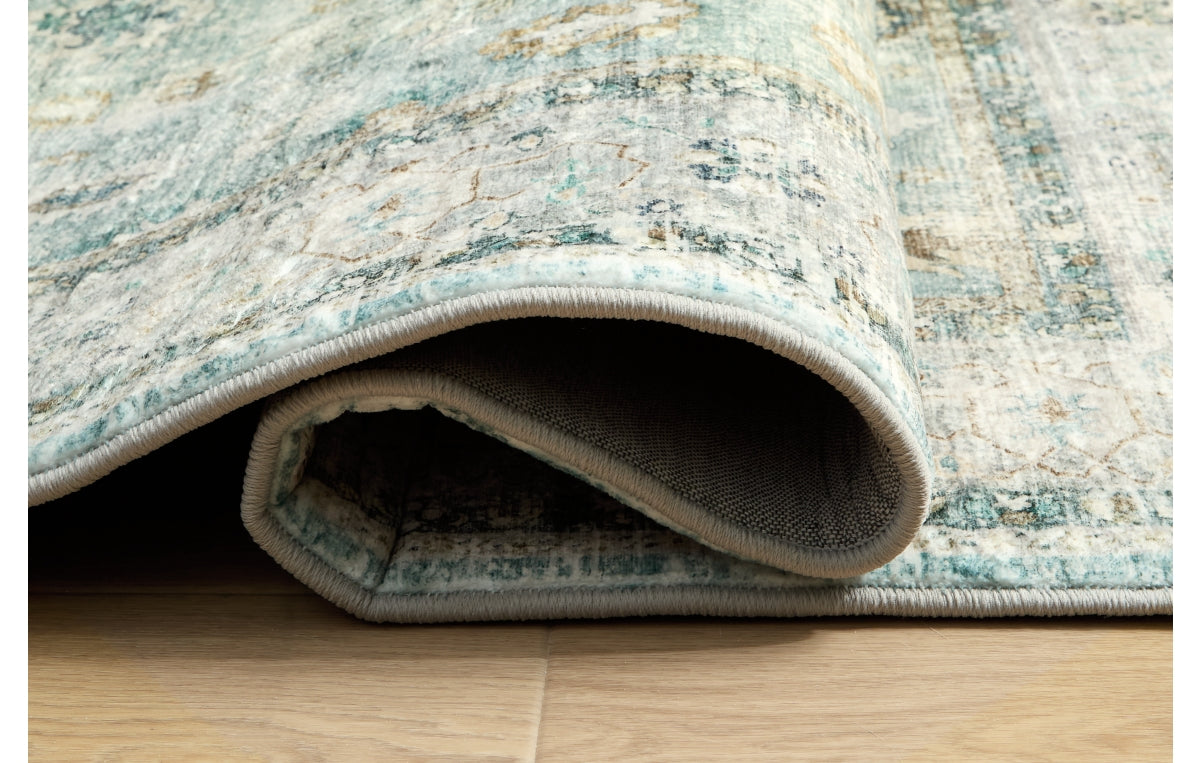 Ladstoney 7'6" x 9'6" Area Rug