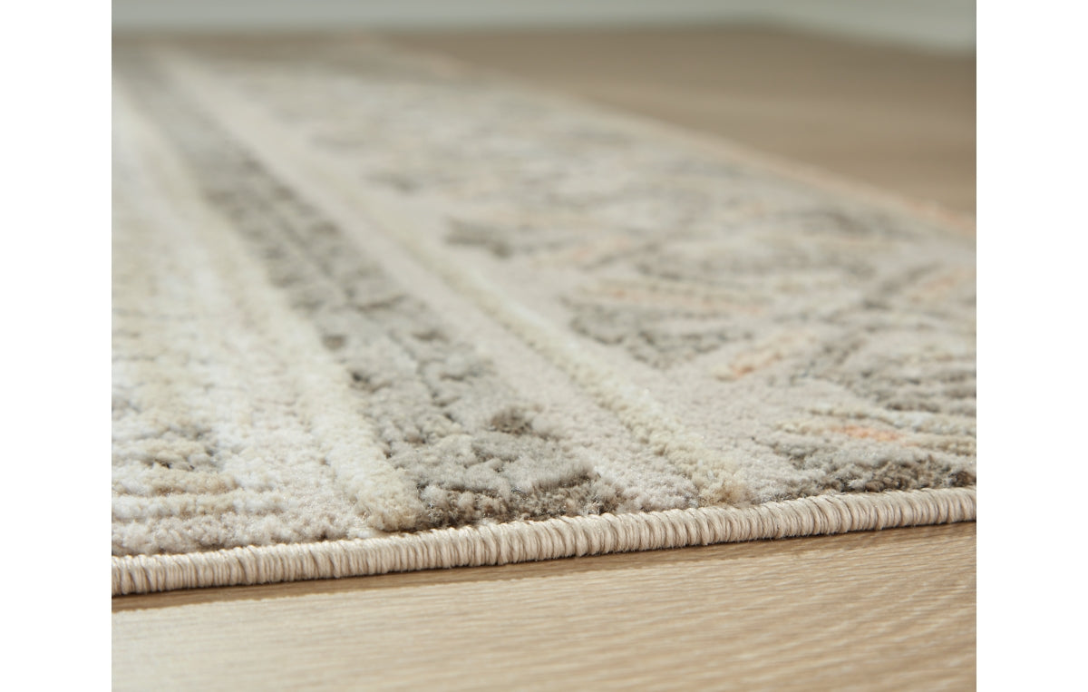 Bachby 5'3" x 7' Area Rug