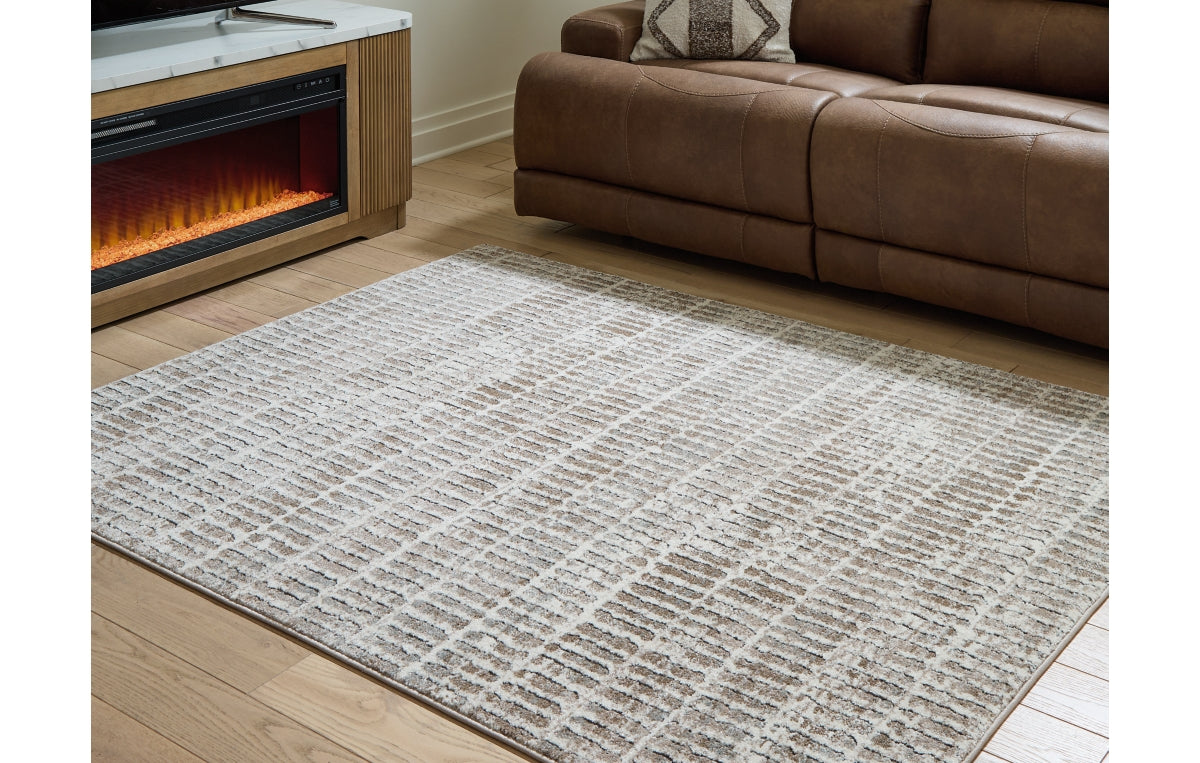 Fuadwick 5'3" x 7' Area Rug