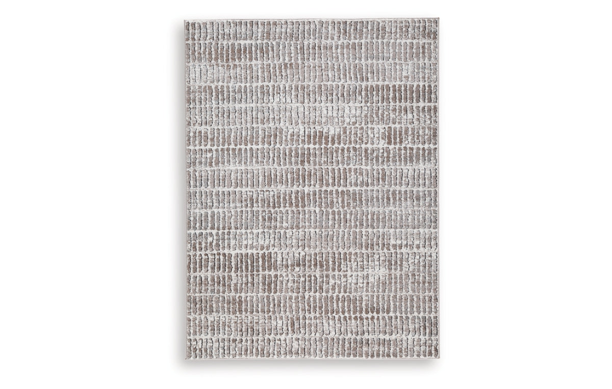 Fuadwick 5'3" x 7' Area Rug