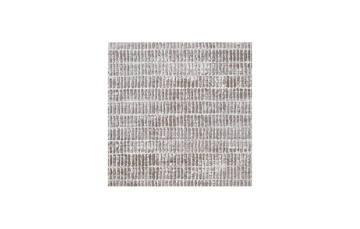 Fuadwick 5'3" x 7' Area Rug