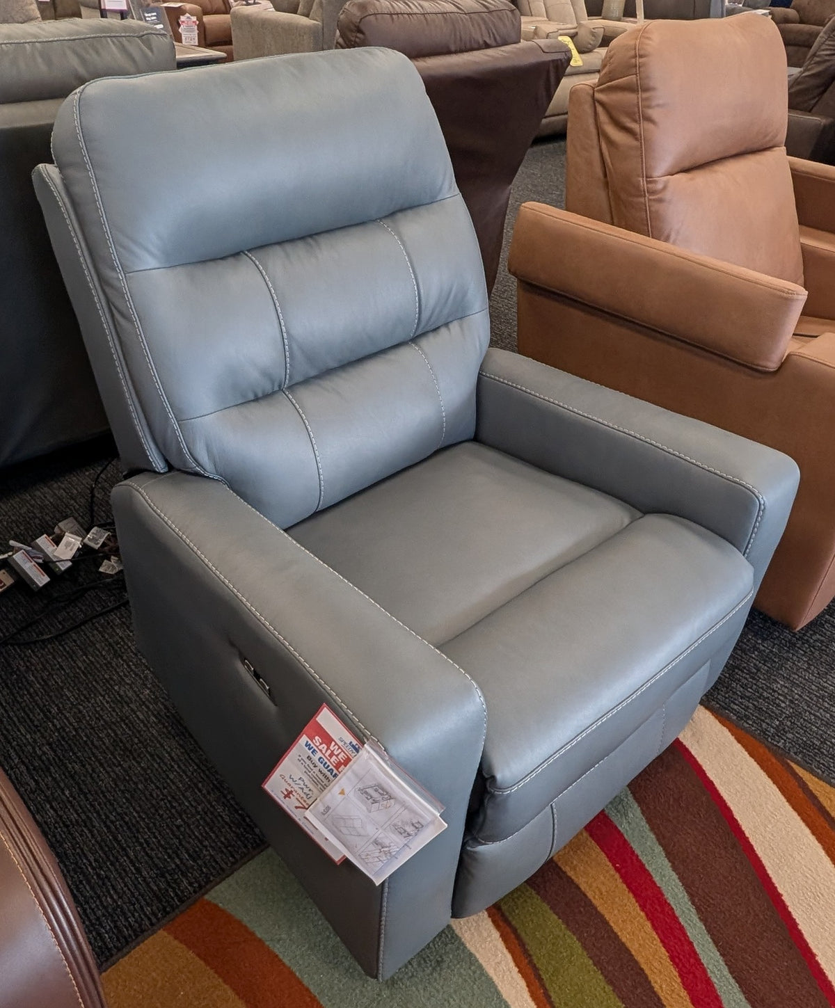 Power recliner with adjustable headrest