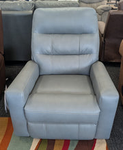 Power recliner with adjustable headrest